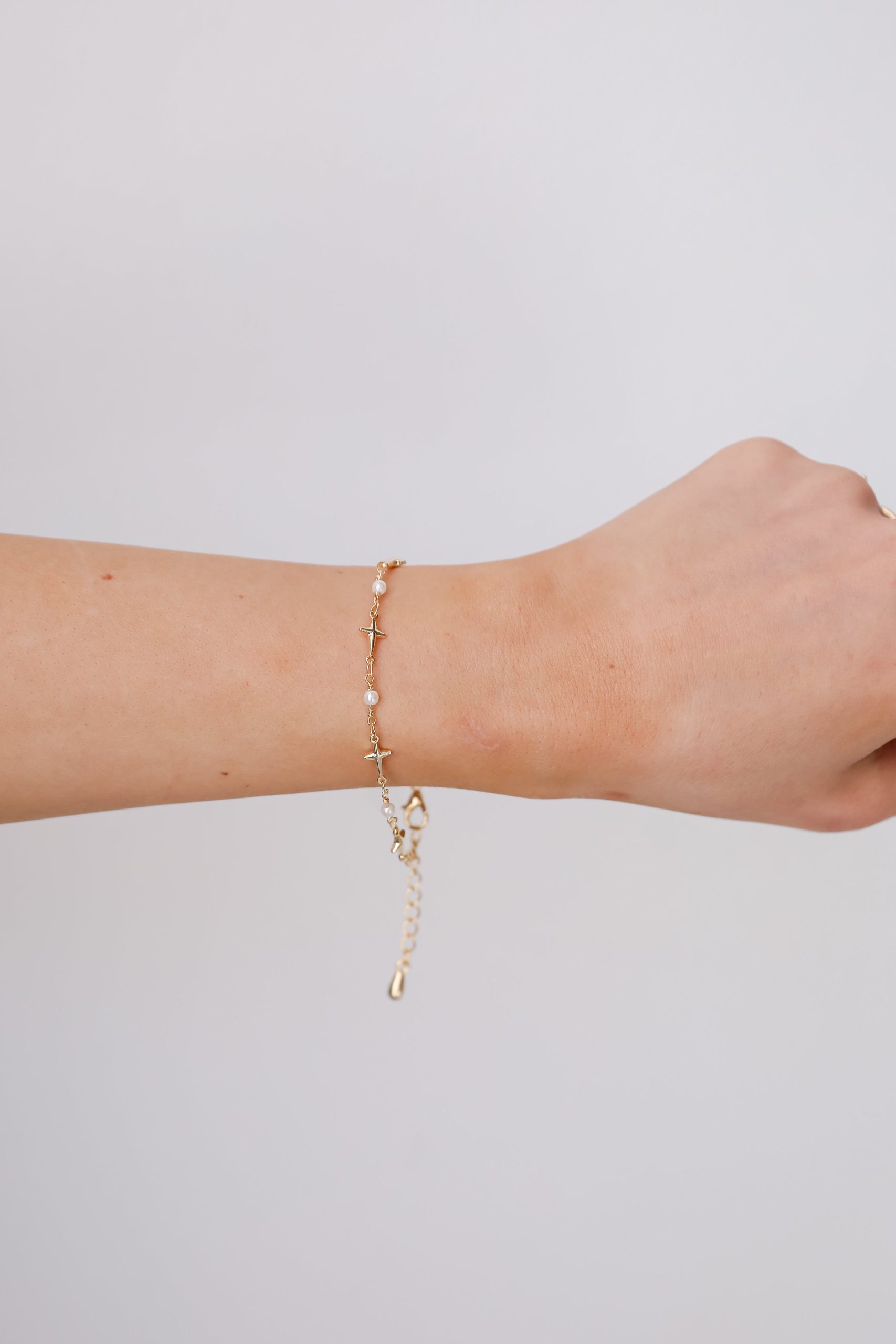 shopdressup_gold_cross_bracelet-2.jpg